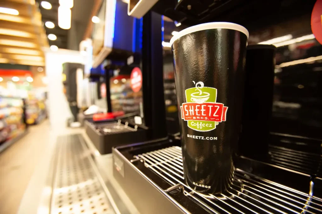 Sheetz nitro cold brew being poured at the store's made-to-order coffee counter with a thick nitrogen foam head